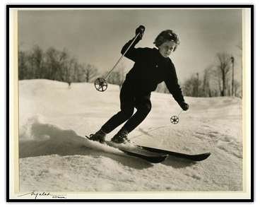 Anne Heggtveit looks down while skiing