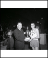 Bill Crothers receiving a trophy