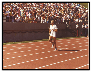 Diane Jones-Konihowski carries the Queen’s baton