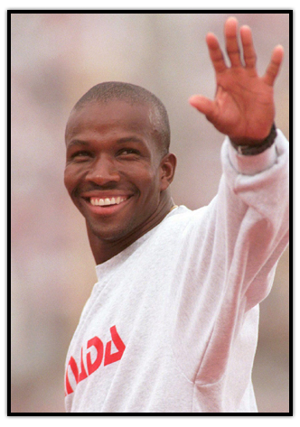 Donovan Bailey salutes the crowd