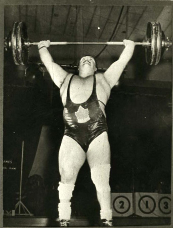 Doug Hepburn competing in a weightlifting competition.