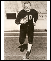 Fritz Hanson with a football under his arm