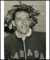 Gérard Côté wearing his Canada jacket and a laurel leaf crown on his head