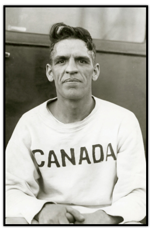 Photograph of Harold Webster wearing a Team Canada warm up shirt