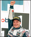 Jacques Villeneuve celebrates Formula One World Championship