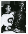 Jean Beliveau celebrating with the Stanley Cup