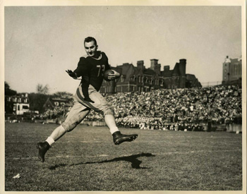  Joe Krol running with the football.