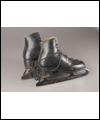 Figure skates worn by Kurt Browning when he landed the first quadruple jump in competition