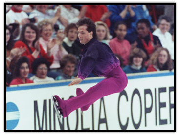 Kurt Browning performing a split jump