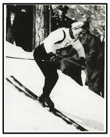 Lucile Wheeler skiing down a hill