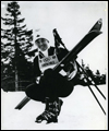 Nancy Greene posing in her Olympic skiing uniform