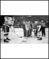 Face-off between Phil Esposito (right) and Vladimir Vikulov