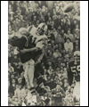 Ron Stewart tackling a player