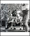 Russ Jackson (left) and Ron Stewart sitting on a bench