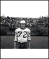 Tony Golab on a football field with his helmet