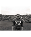 Tony Golab standing on a football field without his helmet